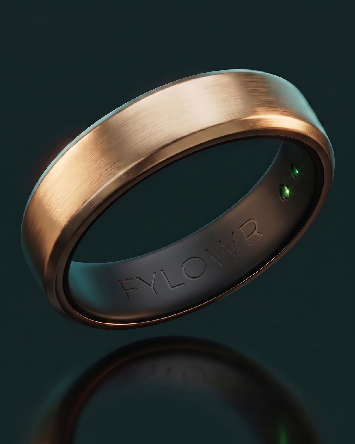 The Fylowr ring: a slim brushed champagne-gold band with a dark interior engraved with the brand name